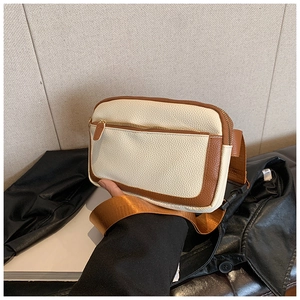 Urban minimalist cream PU leather crossbody bag with brown trim and wide nylon strap