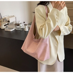Fashionable light pink PU leather Hobo shoulder bag with elegant leather brand patch