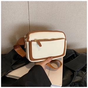 Chic cream and brown PU leather crossbody bag with wide strap and pebble texture finish