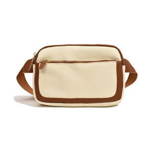 Minimalist beige and brown PU leather crossbody chest bag with gold hardware and zipper