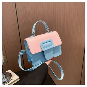 Pink and blue crossbody mini square bag with decorative buckle and top handle