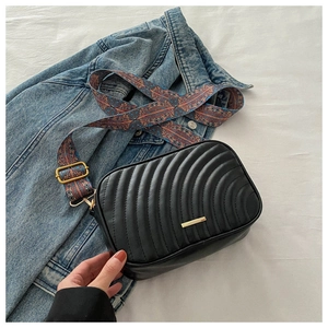 Fashionable PU leather crossbody bag with ethnic style wide strap and gold metal trim