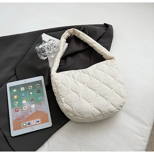 Chic ivory quilted nylon hobo bag with a minimalist diamond pattern for modern women