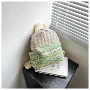 Minimalist woven small backpack with colorful wave patterns and beige canvas straps
