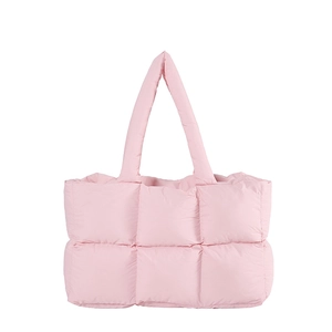 Pink quilted puffer tote bag with large capacity and thick handles in minimalist style