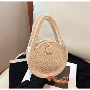 Handmade woven cotton rope tote bag with wood button for summer beach vacations