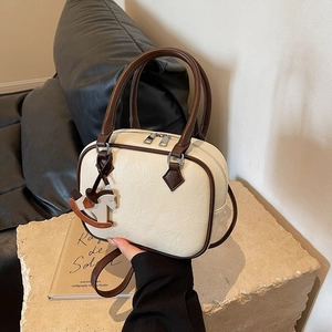 Retro cream white PU leather crossbody bag with horse charm and brown handle straps