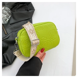 Neon green PU leather crossbody bag with rose embossed texture and wide patterned strap