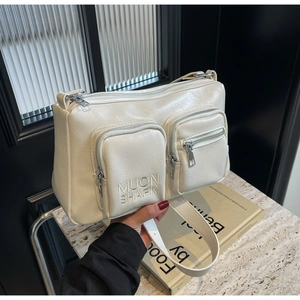 Minimalist white PU leather crossbody bag with double front pockets and pleated texture