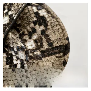 Detail showing the premium snakeskin texture and fine stitching on the PU shoulder bag