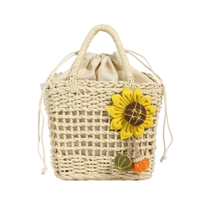 Straw handbag with yellow sunflower decor and drawstring lining on white background