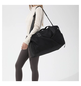 Spacious black waterproof nylon crossbody bag with adjustable strap and side zipper pocket