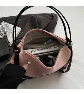 Interior view of pink PU leather tote bag showing large capacity for books and cosmetics