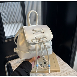 Minimalist beige PU leather backpack with bow drawstring and blue bead details