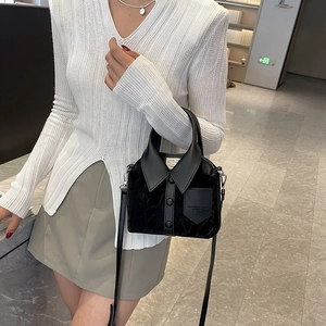 Creative black shirt-shaped bucket bag with leather handles and decorative buttons