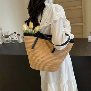 Large capacity straw tote bag with black straps for summer beach beach trips