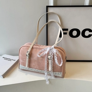 Pink PU leather shoulder bag with floral pattern bottom and lace tassel bow detail