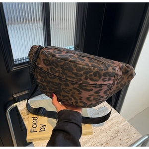 Stylish leopard print canvas crossbody chest bag with adjustable black strap for women