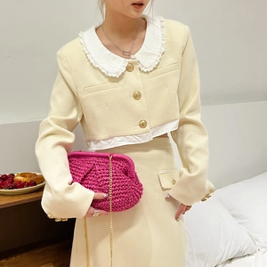 Elegant beige tweed two-piece set featuring lace Peter Pan collar and gold button details
