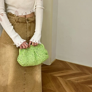 Handcrafted light green straw woven cloud clutch bag for summer beach fashion style