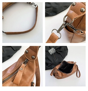 Detail of vintage brown textured handbag showing metal hardware and inner compartments