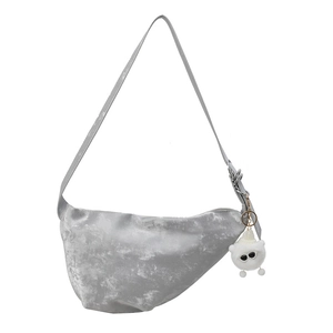 Silver large capacity crossbody dumpling bag with white plush monster charm
