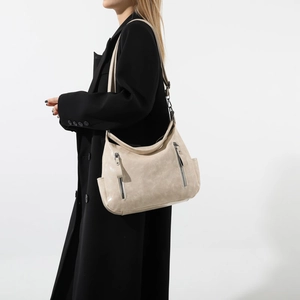 Vintage retro cream hobo bag with multi-pocket design and glossy faux leather finish