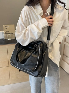 British style large black leather tote bag with silver zippers for daily commute women