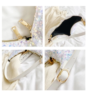 Detailed shots of white sequin shoulder bag showing gold buckle and fabric lining