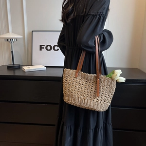Fashionable hollow paper rope woven beach shoulder bag with brown leather straps