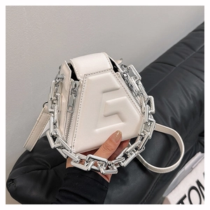 White geometric triangle handbag with embossed letter design and silver chain strap
