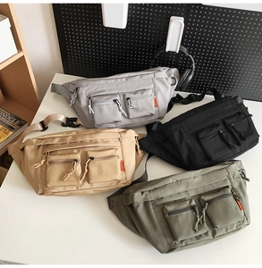 Vue détaillée de sacs de poitrine utilitaires en gris, noir, kaki et vert olive
