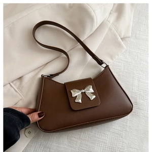 Deep brown PU leather shoulder bag with a stylish silver bow decoration for women
