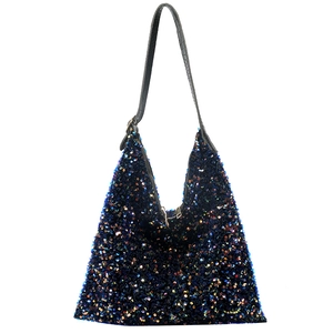Detailed macro view of sparkling blue sequins and crocodile texture strap on hobo bag