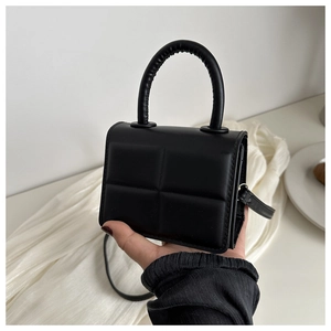 Fashionable black PU leather mini handbag with square embossing and crossbody strap