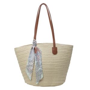 Summer woven straw tote bag with brown leather handles and decorative silk scarf