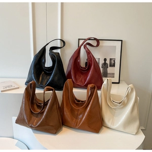 Detailed display of Hobo tote bags in five colors with polished oil wax leather texture