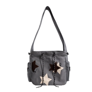 Gray canvas messenger bag with American star patches and large capacity for students