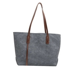 Borsa tote minimalista in tela grigia con manici in pelle marrone per la moda femminile