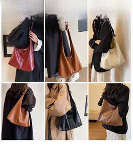 Macro detail of large glossy oil wax PU leather hobo tote bag in multiple colors