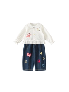Mädchen-Set aus weißer Baumwollbluse und marineblauer Wide-Leg-Jeans für den Frühling