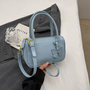 Light blue PU leather handbag with butterfly charm and detachable crossbody strap