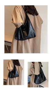 Three-view perspective of a large black faux leather tote bag worn by a female model