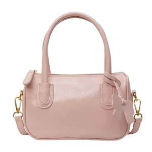 Fashionable light pink PU leather handbag with detachable strap and bow charm decoration