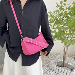 Fashionable rose pink studded crossbody bag with matte finish and wide strap for women