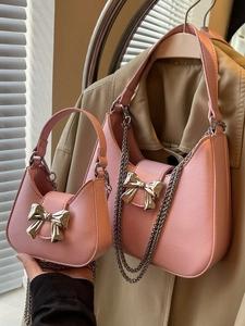 Stylish pink bow handbag set with metal chain and lychee texture vegan leather