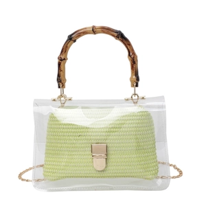 Fashionable transparent PVC handbag with bamboo handle and green woven inner bag
