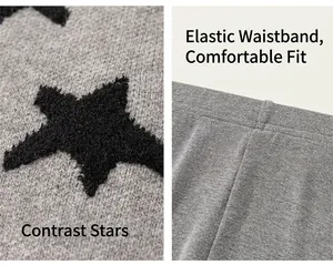 Detail van grijze gebreide kinderbroek met gevlokt sterpatroon en elastische taille