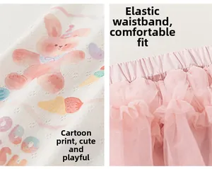 Detail of girls' skirt showing elastic waistband and cute cartoon printed fabric
