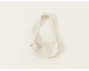 Close-up of a blue and white striped crossbody bag for kids with zip closure